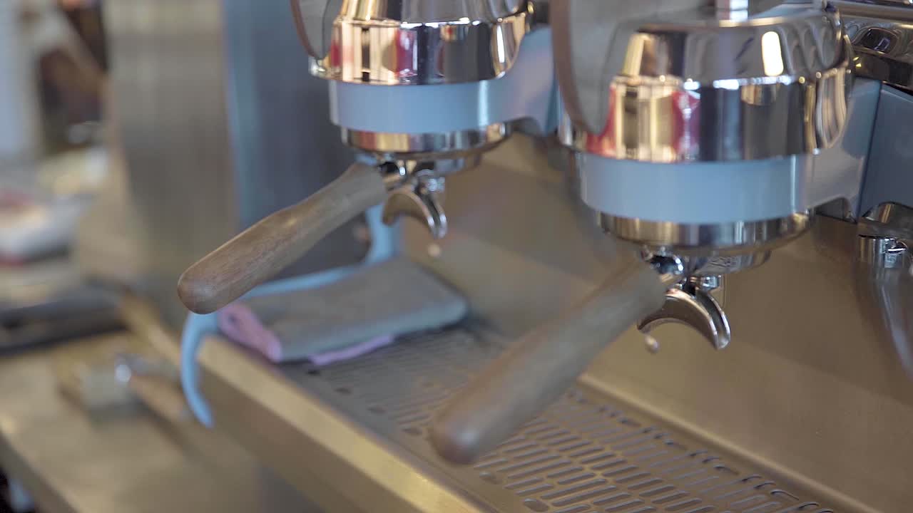 Portafilters Attached On Group Head In Coffee Maker Machine