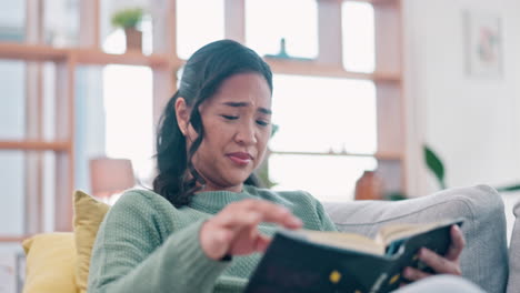 Woman,-reading-book-and-cringe