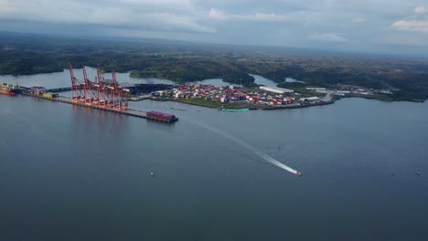 aerial shot flying towards the port of buenaventura in colombia