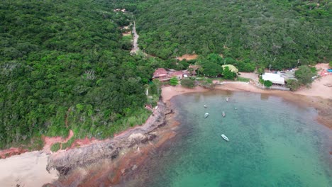 Fly-over-Tartaruga-beach,-Búzios,-Brazil