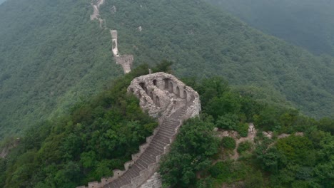 Aerial-push-in-on-deteriorated-lookout-tower-of-rural-part-of-Great-Wall-of-China