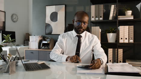 businessman working at his office desk
