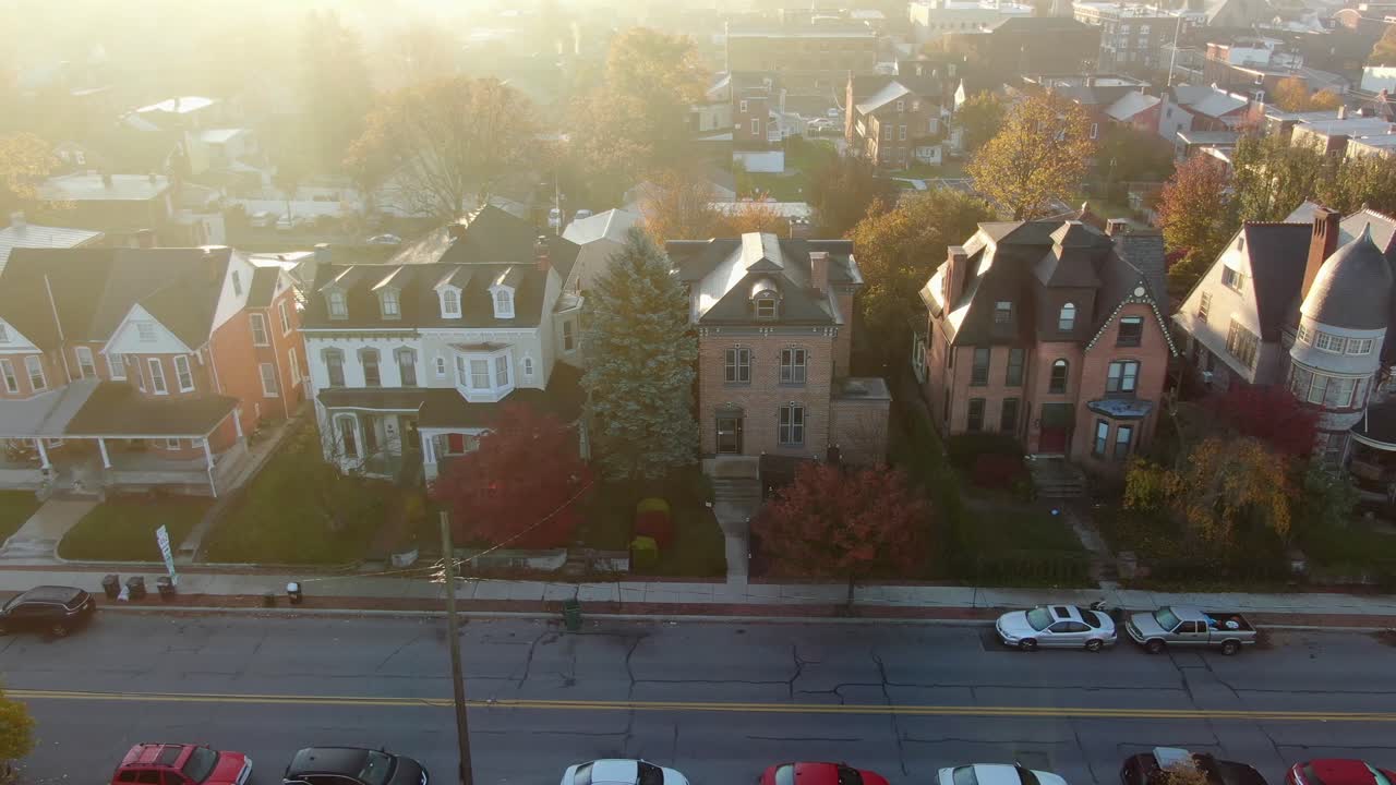 Upscale Victorian and Colonial homes in USA during magic hour light