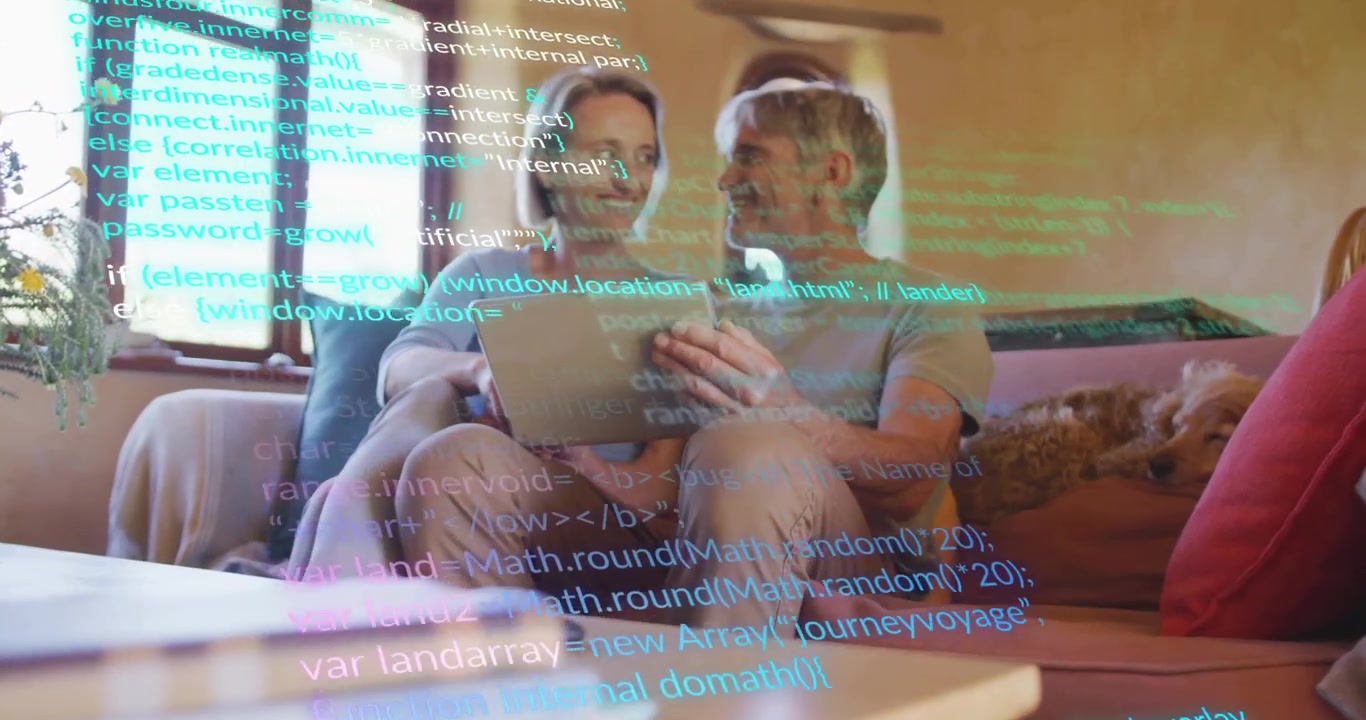 Mature couple tapping and swapping tablet on table while code overlay scrolling in living room
