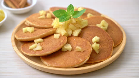 apple pancake or apple crepe with cinnamon powder