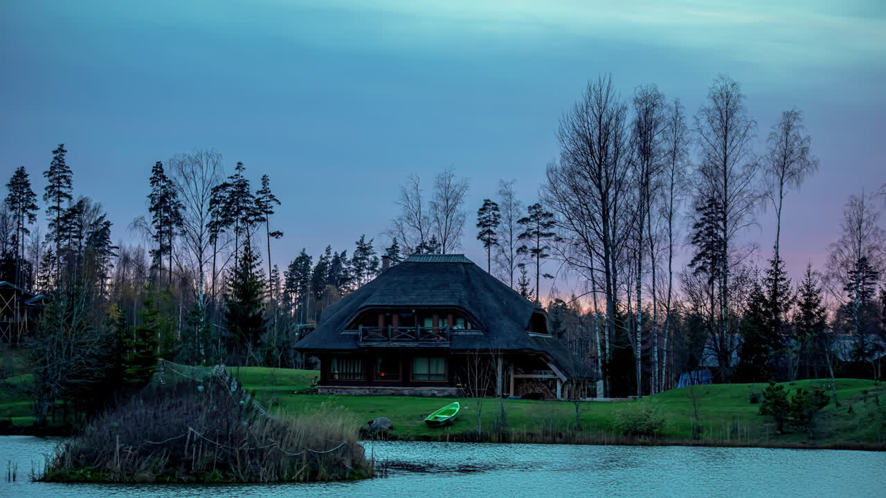 Time lapse River Landscape to a Wooden Cabin in the Forest Pink Sunset Skyline