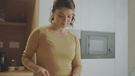 woman preparing breakfast at home