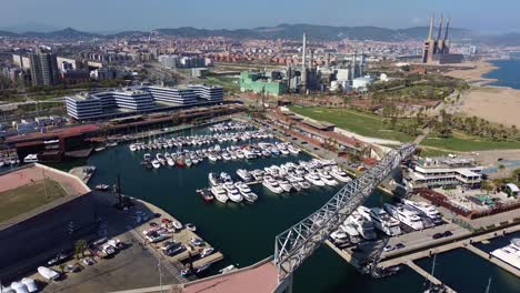 General-aerial-shot-of-the-port-of-El-Forum-in-Barcelona,-Spain-on-a-sunny-day