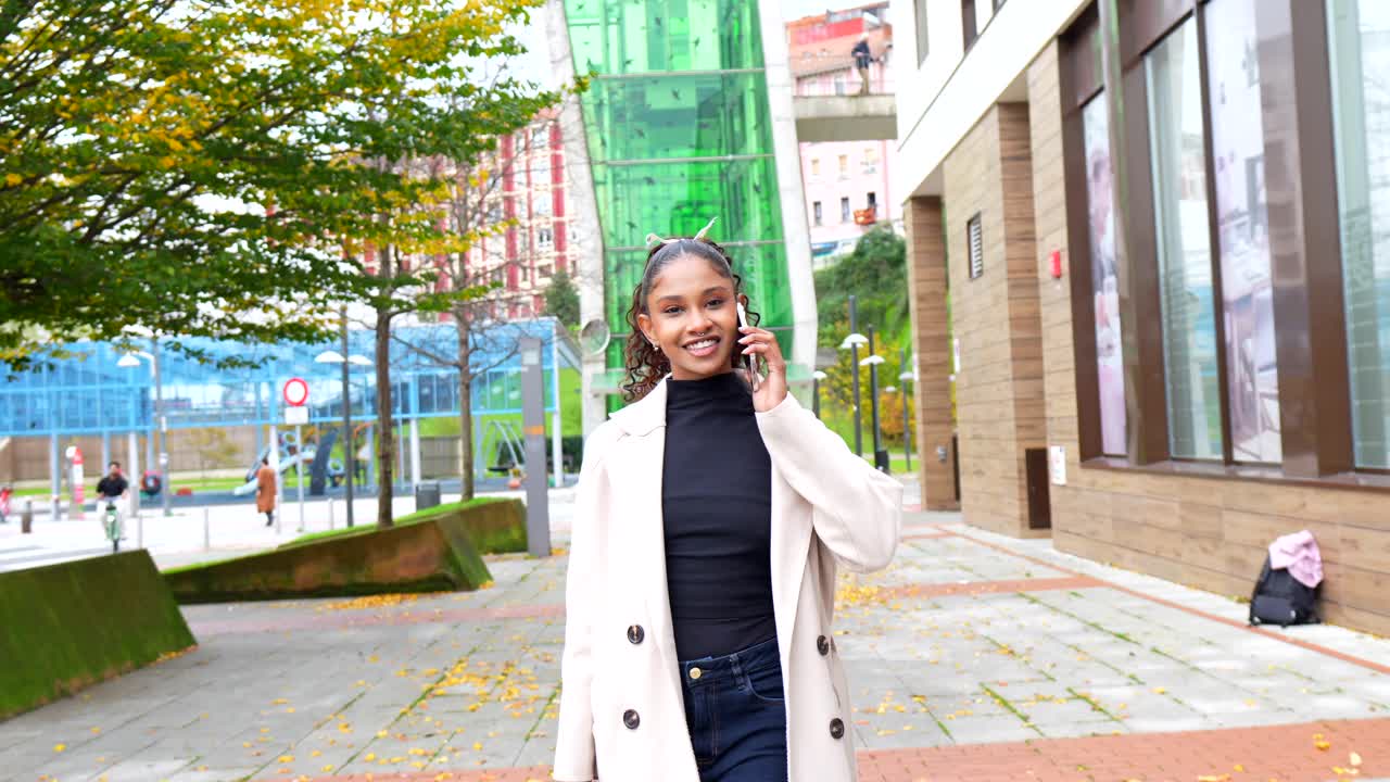 Woman Talking on Phone in Urban Setting