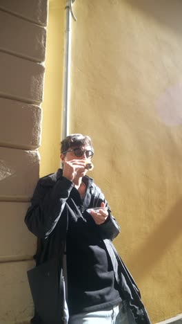 Person enjoying a coffee outdoors