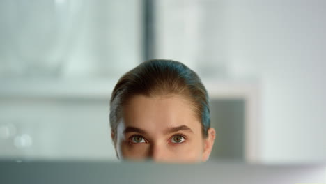 Thoughtful-freelancer-looking-laptop-searching-inspiration-at-home-closeup.