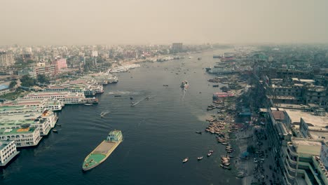 4k-Drone-shot-of-launch-moving-on-a-river