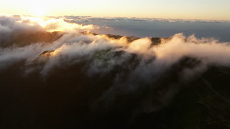 sunrise at pico do arieiro mountain peak in madeira, portugal - aerial drone shot