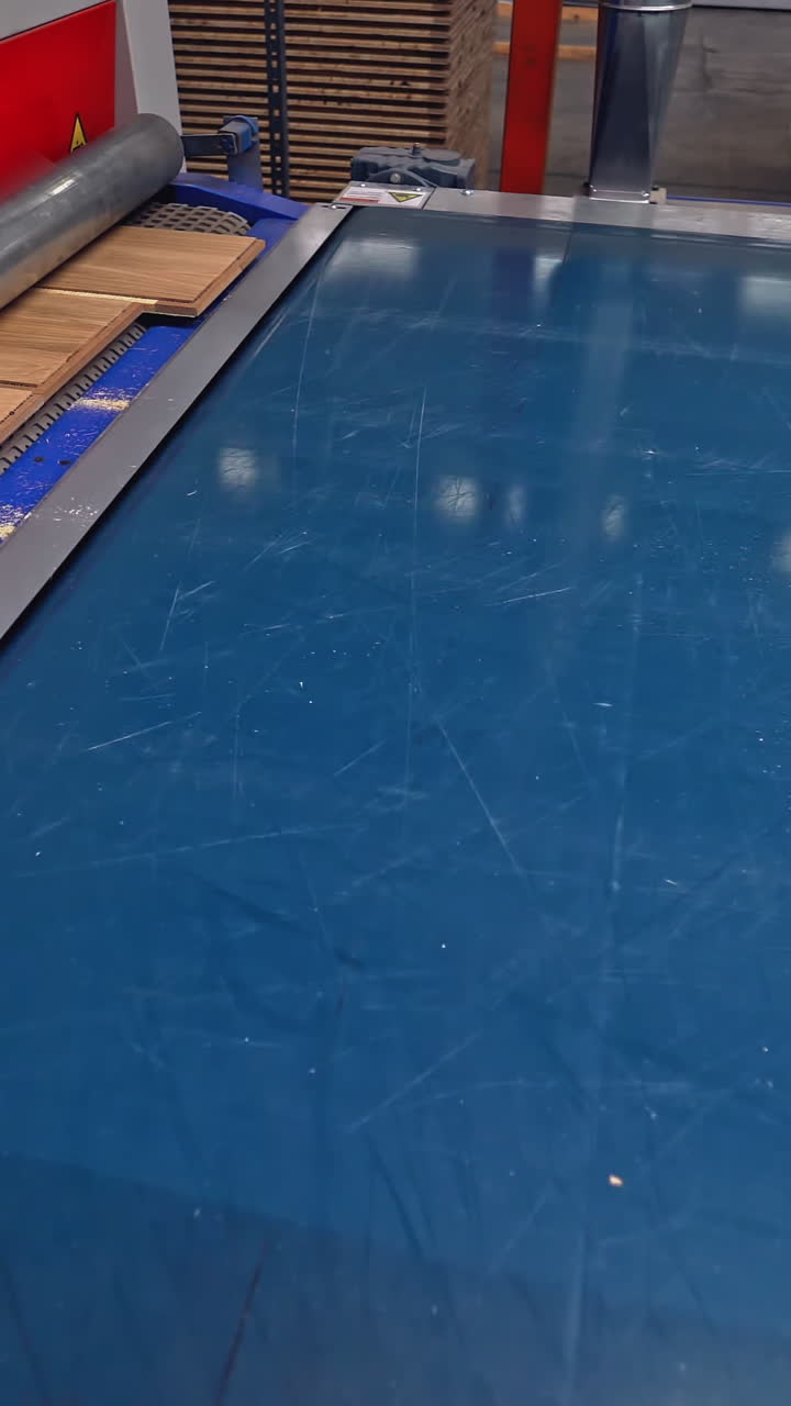 Modern Production of parquet board. Industrial production line. Vertical video