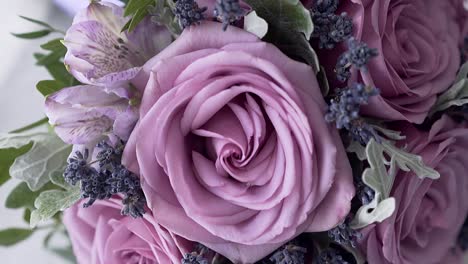 wedding-bouquet-of-nice-purple-roses-slow-motion-closeup