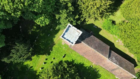 A-top-down-roll-shot-of-the-Lady-Magdalene-church-tower-in-Denton,-Kent