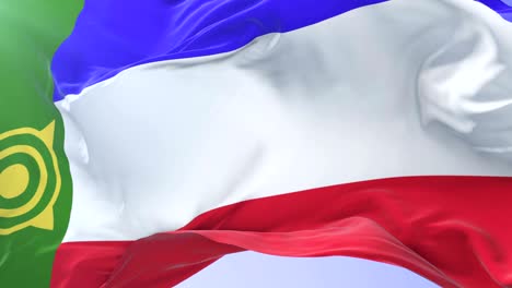 khakassia flag waving at wind with blue sky in slow, loop