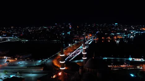 aerial night view of new mosque. there says " be responsible, be happy"