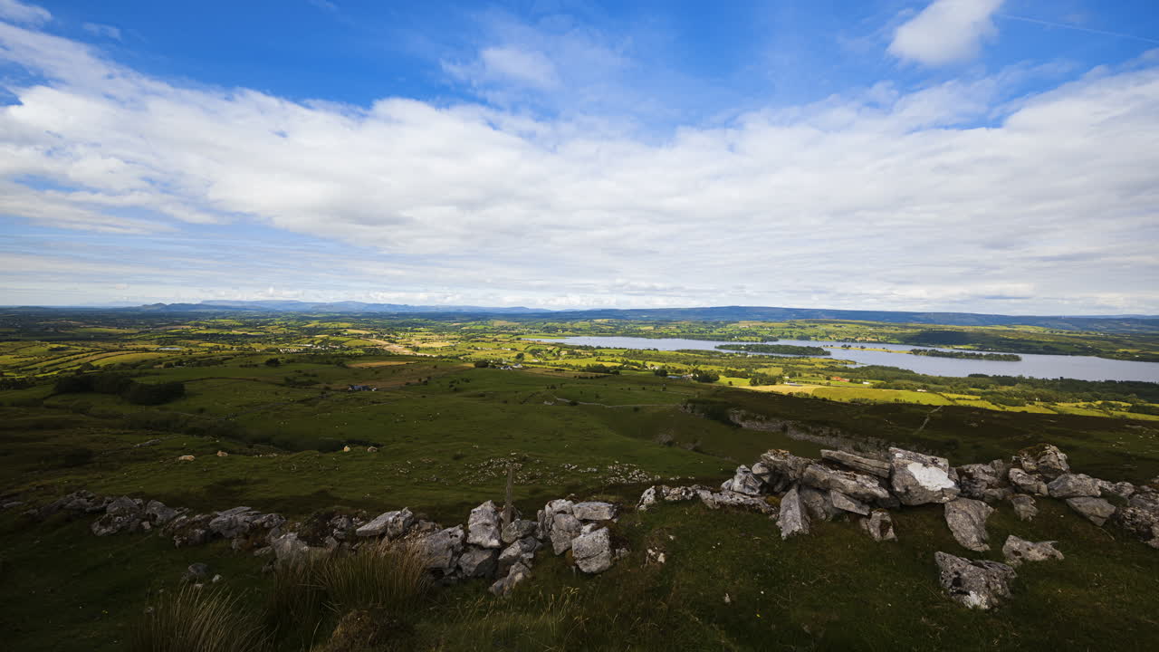 Time lapse of rural and remote landscape of grass, trees and rocks during the day in hills of Carrowkeel in county Sligo, Ireland