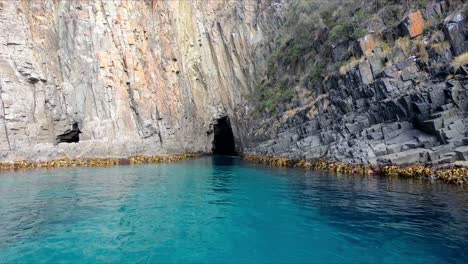 crystal clear and blue waters around the rocks at bruny island