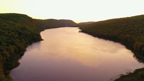 Pullback-to-reveal-massive-Lake-of-the-Clouds-in-Porcupine-Mountains-State-Park-during-Sunrise