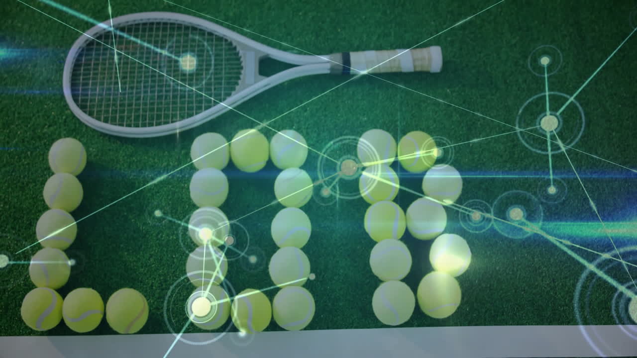 White tennis racket lying flat on turf showing yellow ball grid with neon network overlay