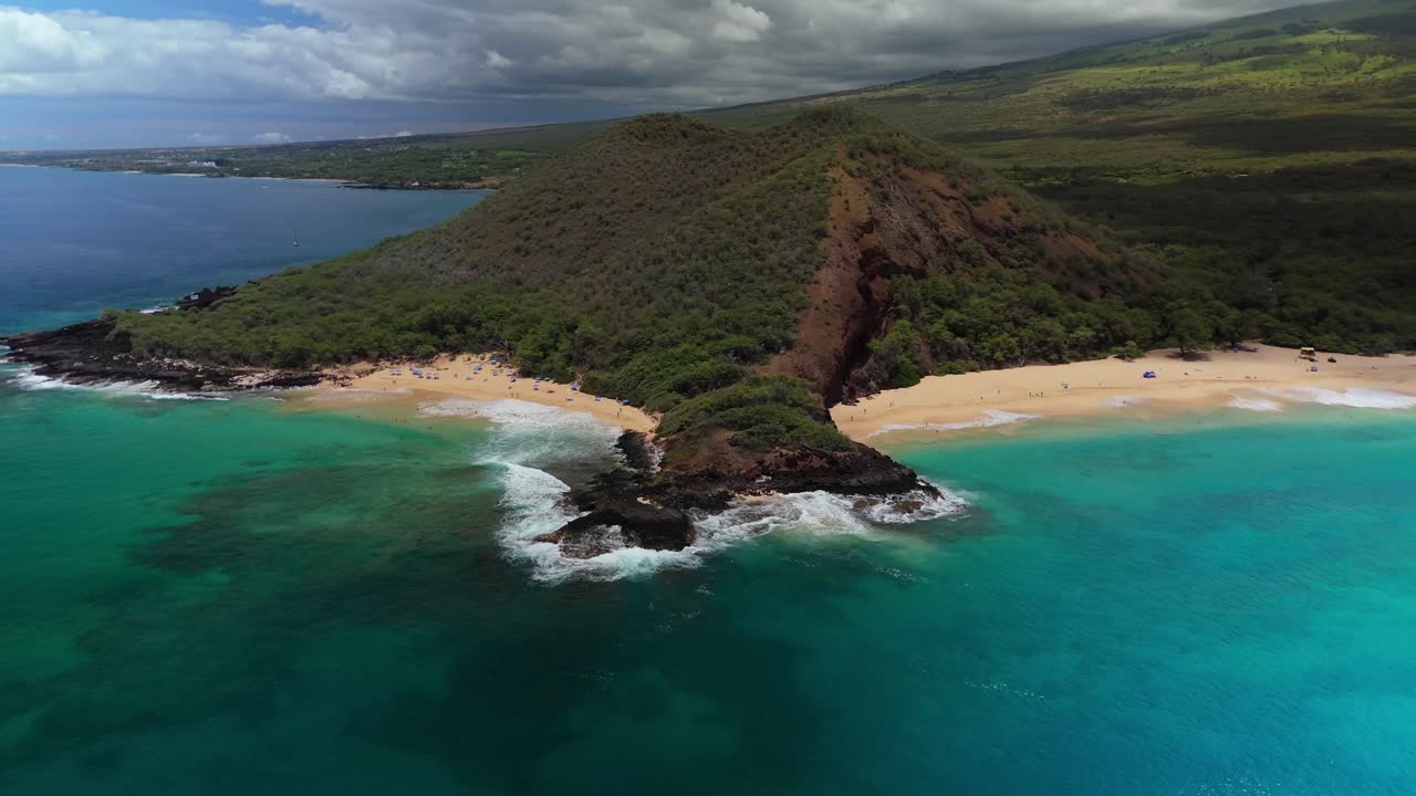 Aerial approach of Makena state par, big beach and little beach in Maui Hawaii