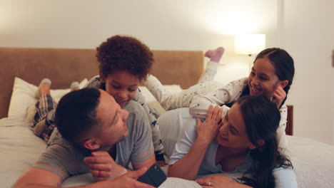 Family,-relax-and-excited-kids-in-bedroom