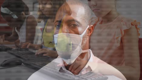 video compuesto de un hombre afroamericano con máscara facial contra niñas diversas usando computadora