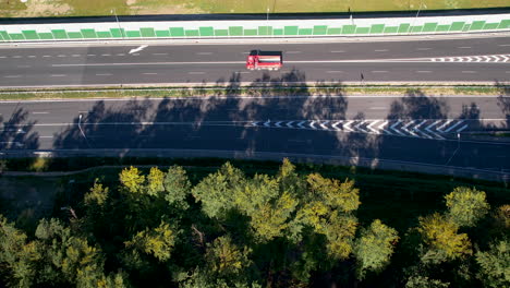 Aerial-top-down-shot-of-traffic-on-highway-in-Gdynia-during-sunny-day,-Poland