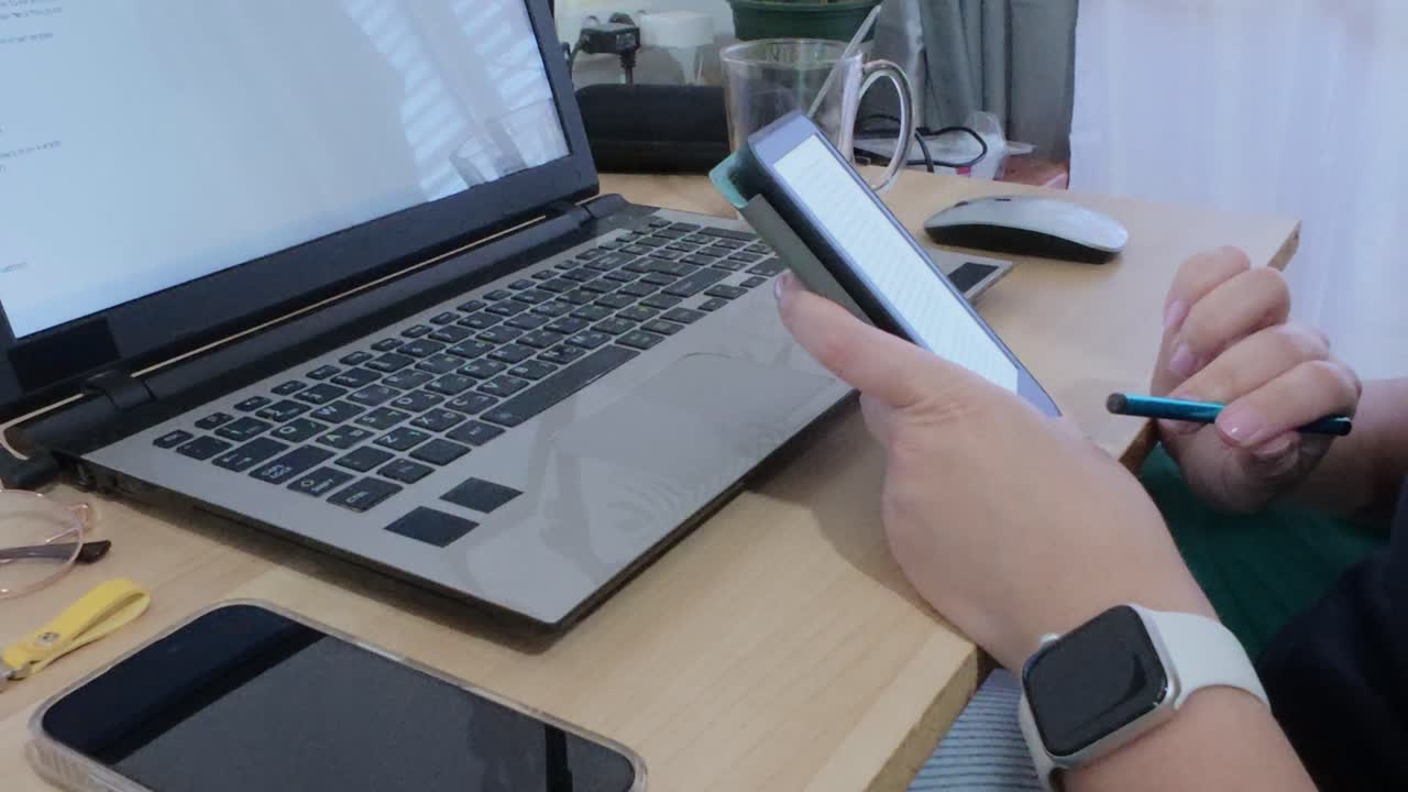 Hands demonstrating an efficient digital workflow, seamlessly using a tablet for specific tasks