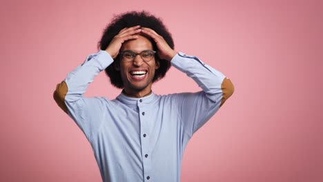 positive surprised man shakes his head in disbelief