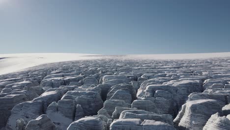 aerial ascending reveal shot of the buerbreen area in folgefonna glacier in norway