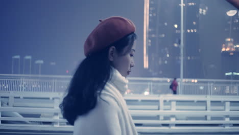 Portrait-Of-Happy,-Elegant-Confident-Woman-Girl-Walking-On-Bridge-In-City-At-Night