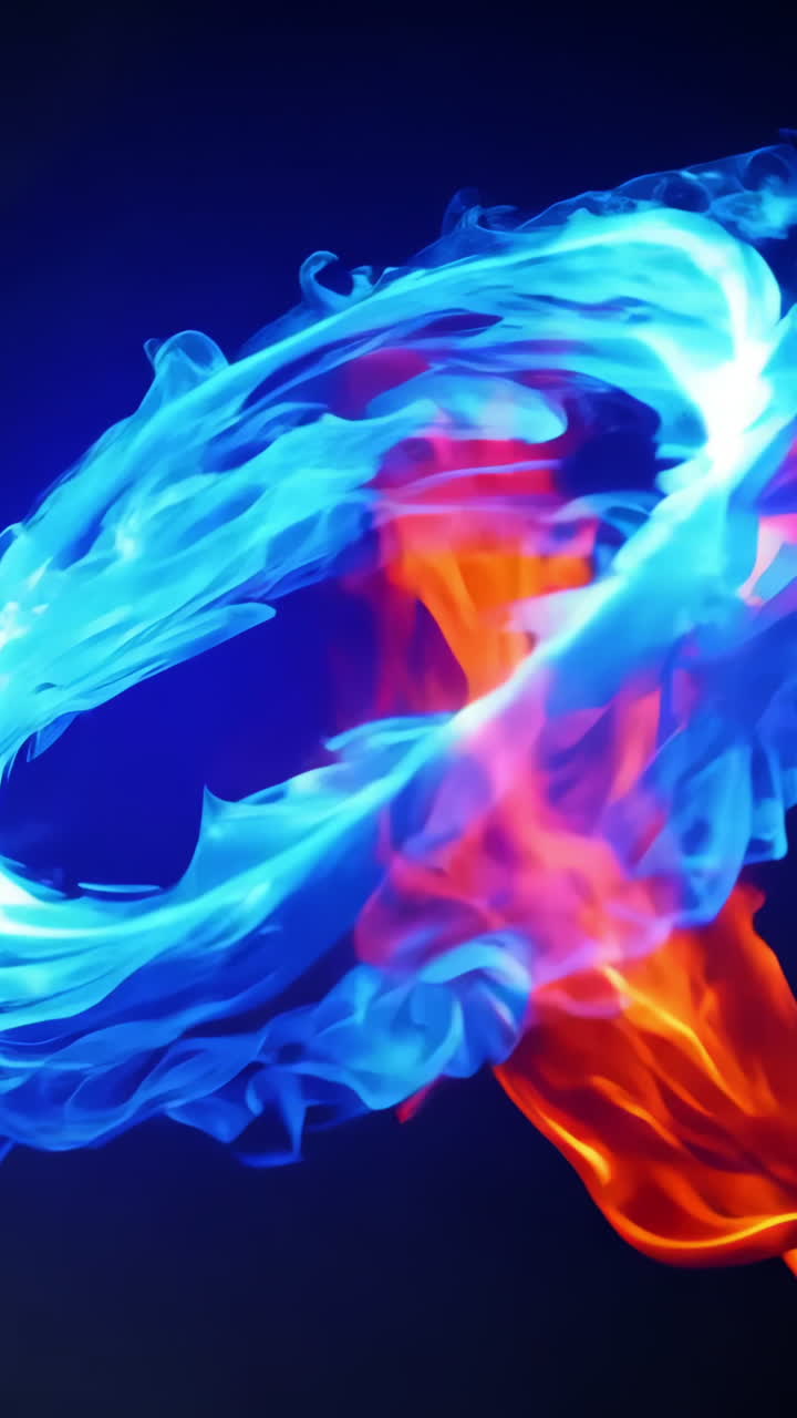 A blue and orange flame is shown in the center of a circle. The blue and orange flames are swirling around each other, creating a sense of movement and energy