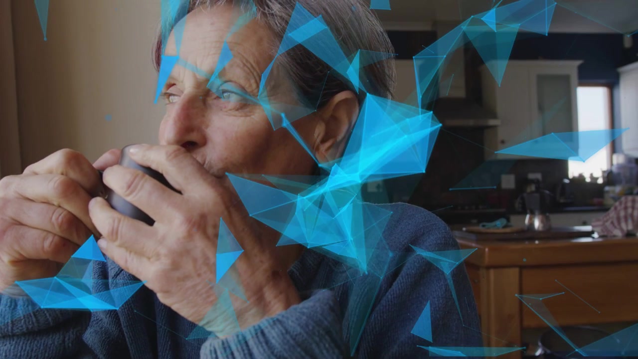 Senior female sipping mug at kitchen, causing blue triangles overlay clearing from face for health