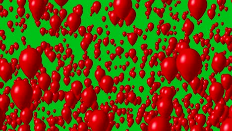 globos rojos volando en la pantalla verde