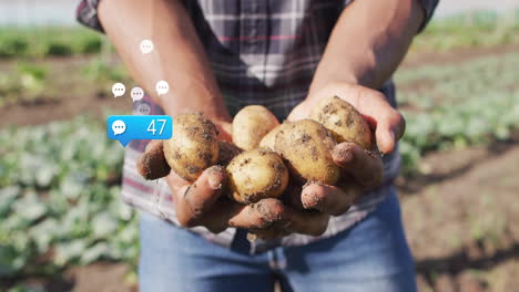 man holding fresh potatoes in agriculture field, with floating chat bubbles showing 47 comments