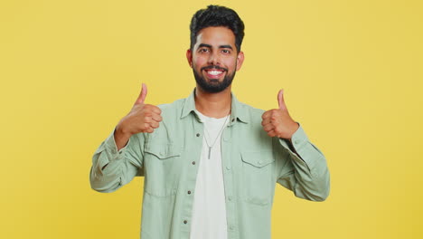 Indian-man-raises-thumbs-up-agrees-or-gives-positive-reply-recommends-advertisement-likes-good-idea