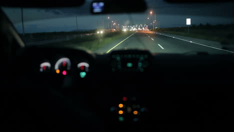 car at the toll collection point night