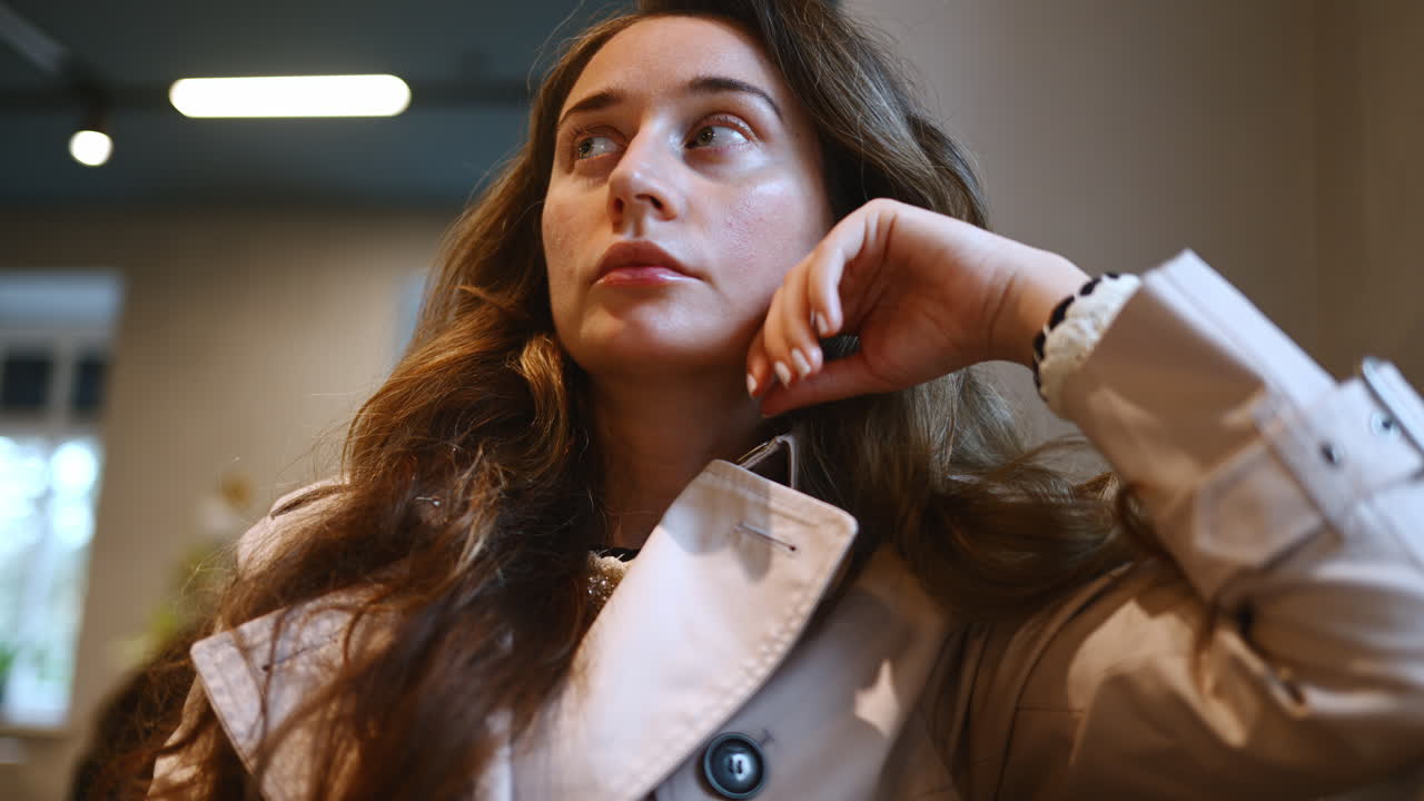 Woman talking with the waiter at a cafe