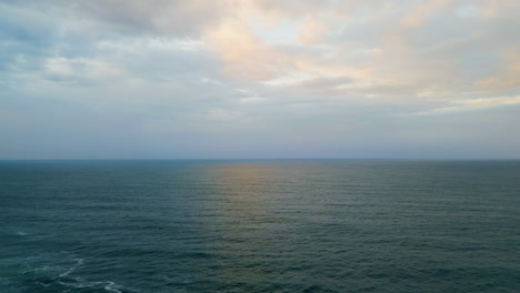 panoramic cloudy marine landscape overcast weather. aerial rays breaking clouds.