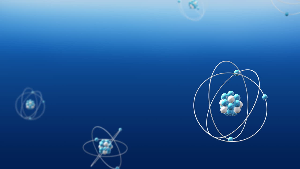 Animation of atom models spinning on blue background