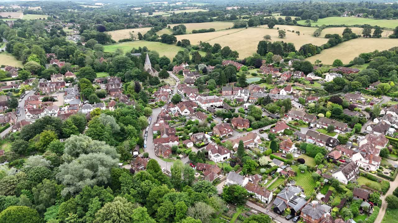 Shere Surrey UK quaint English Village high angle establishing aerial shot