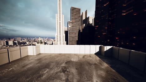 View from the rooftop of a building overlooking a bustling city skyline