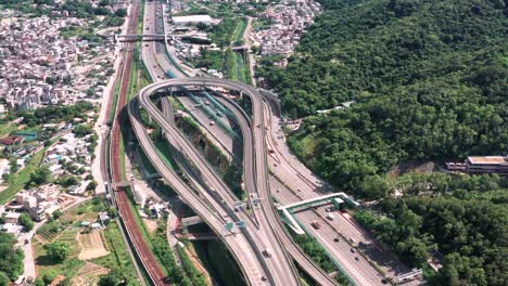 aerial orbit around bustling highway interchange kowloon hang tai po hong kong