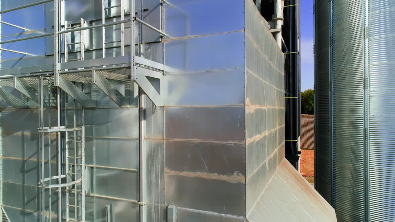 Storage and drying of cereals. Aerial drone view of agricultural silos