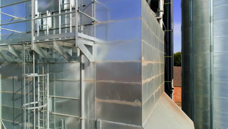 storage and drying of cereals. aerial drone view of agricultural silos