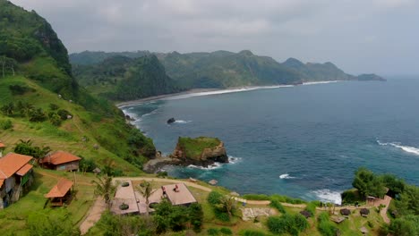 paradise landscape of javanese coast near menganti beach indonesia, aerial dolly