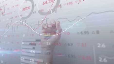 animation of trading board, multiple graphs and loading circles over cropped hand opening fist